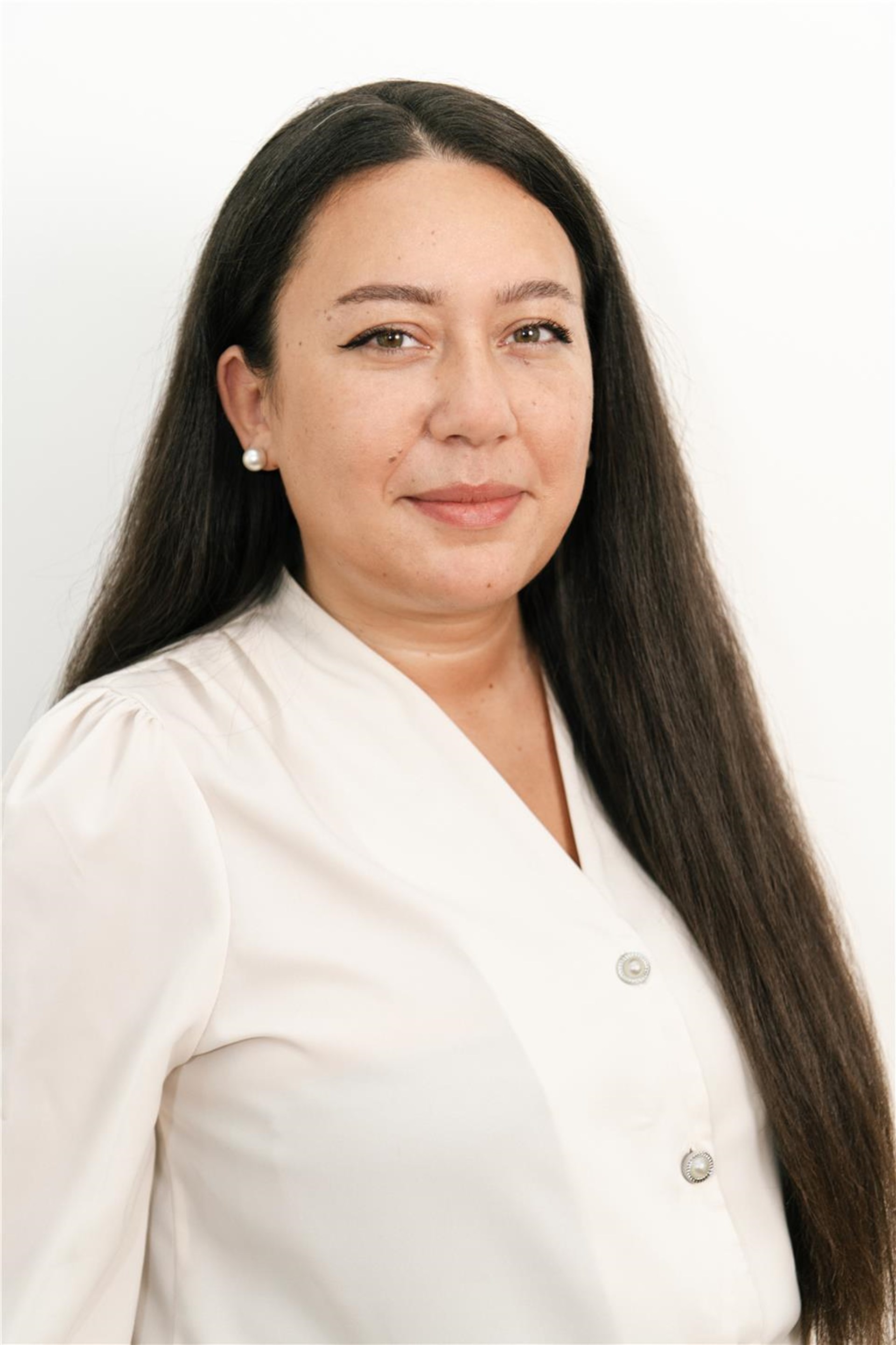 Porträtbild von Kader Yüce, Pflegedienstleitung Altenheim St. Josef.